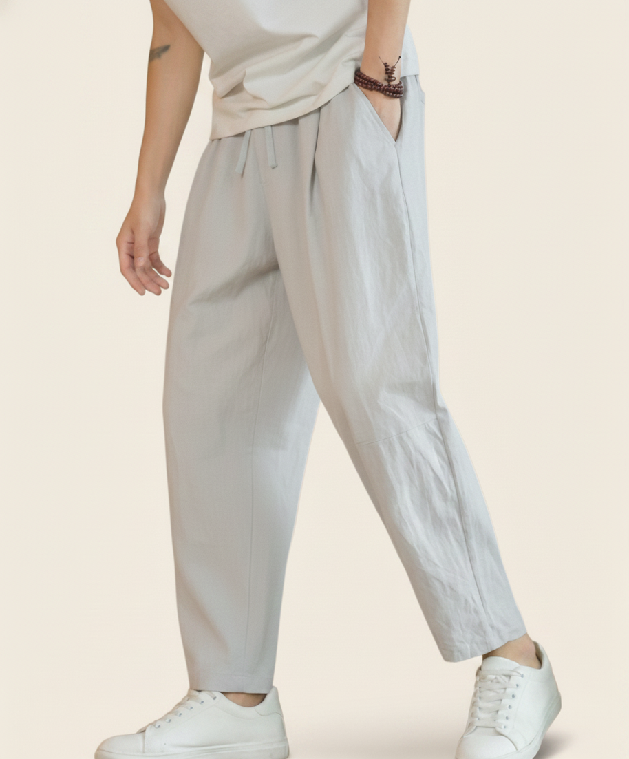 Looksmaxxing Cancun cotton trousers in light grey, product photo