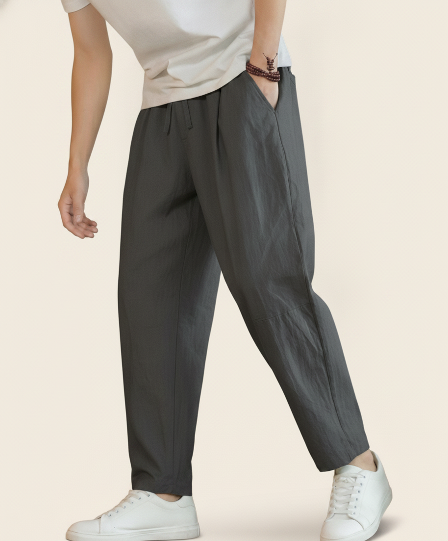 Looksmaxxing Cancun cotton trousers in dark grey, product photo