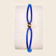 Blue cord bracelet with gold bead from the Amalfi Blue set